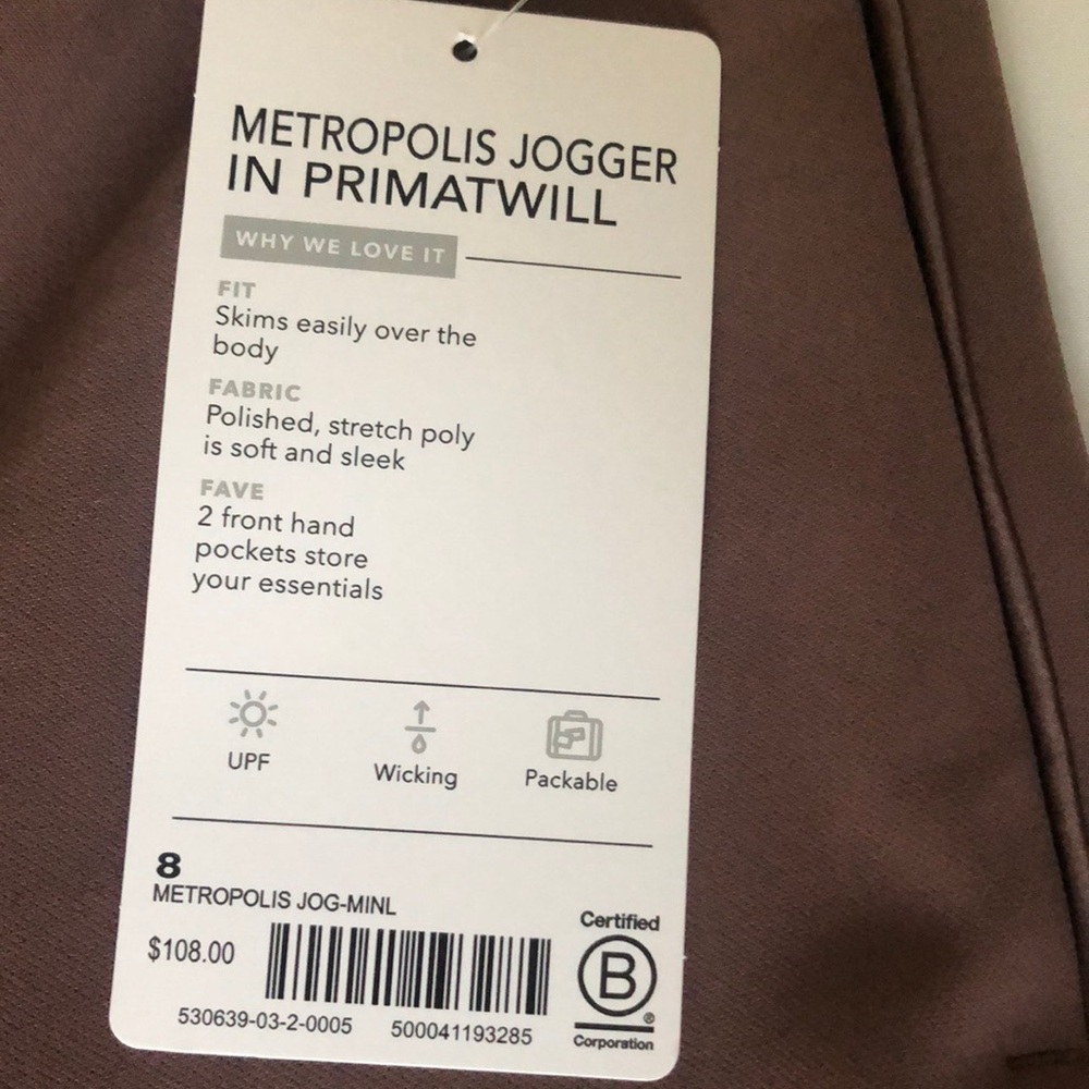 Size 8 new w/tag on, drawstring 2 pockets.